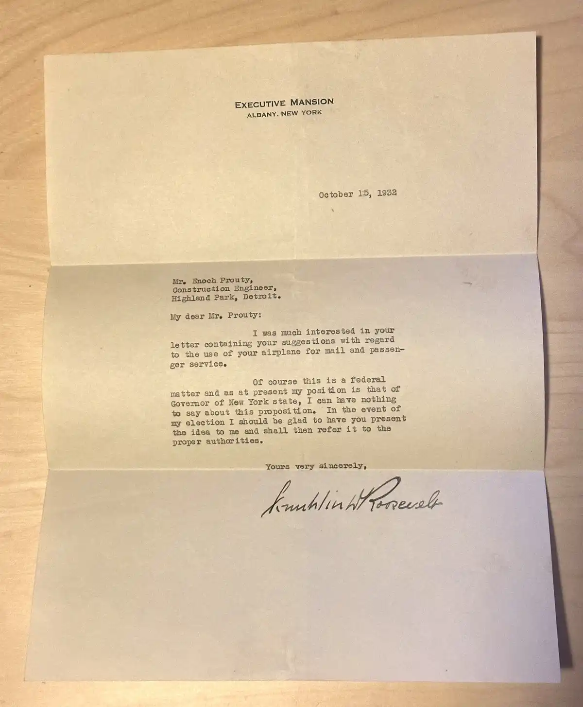 A vintage, folded typewritten letter dated October 15, 1932, from the Executive Mansion in Albany, New York, addressed to…