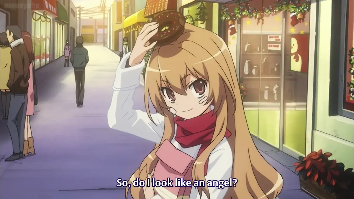An anime girl with long blonde hair and a red scarf stands on a street, holding a chocolate-frosted donut on her head like a…