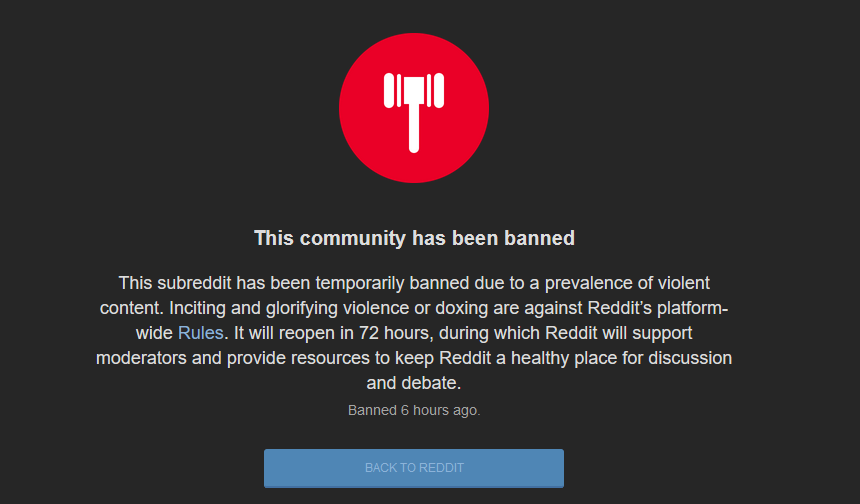 A Reddit community ban screen shows a red circle with a white gavel icon, followed by text stating the subreddit has been…