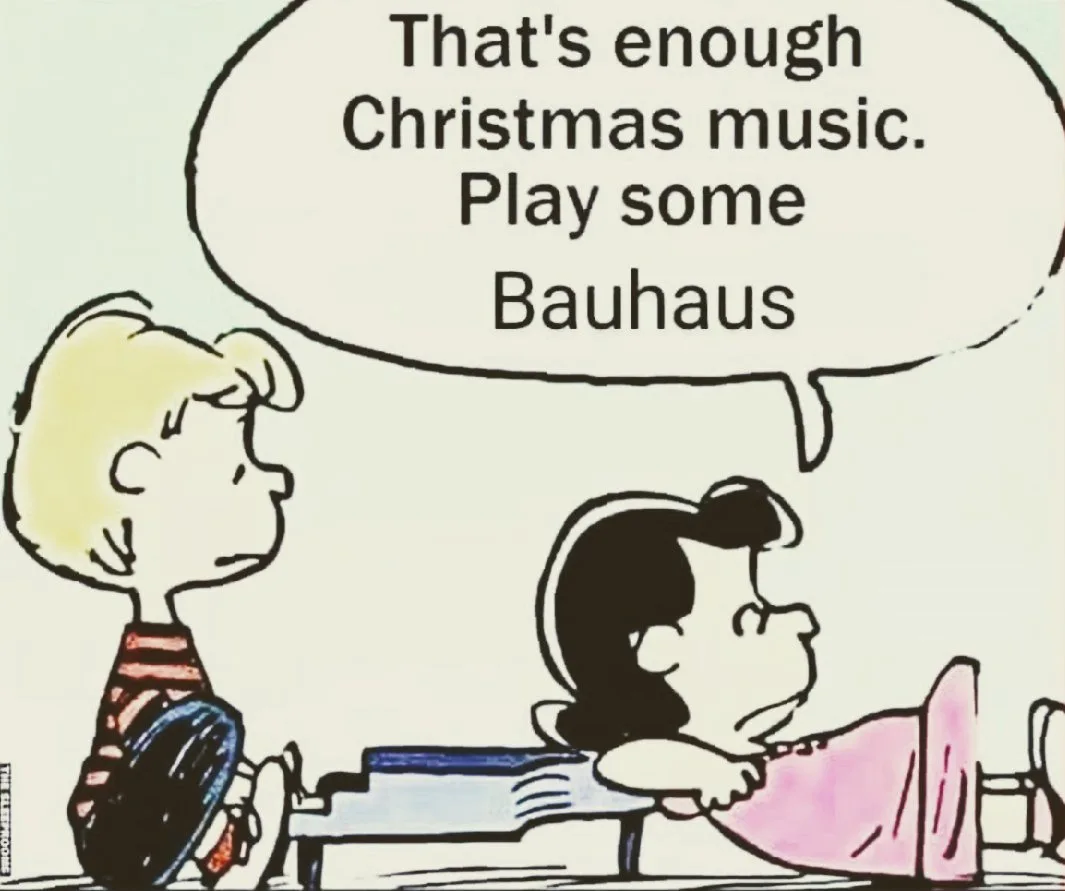 A Peanuts comic strip panel shows Lucy van Pelt at a piano with a speech bubble saying 'That's enough Christmas music. Play…