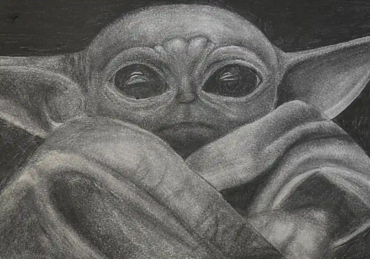 A detailed charcoal drawing of Baby Yoda (Grogu) with large, expressive eyes, peeking out from under a blanket. The image…