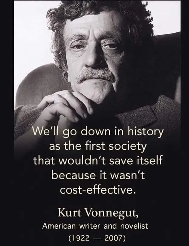 A black-and-white portrait of Kurt Vonnegut, an older man with a mustache, looking thoughtfully at the camera with his chin…