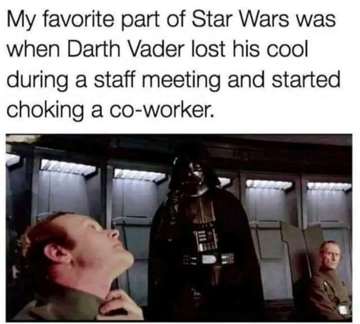 The image shows Darth Vader choking a man in what appears to be a staff meeting setting, with another man seated in the…