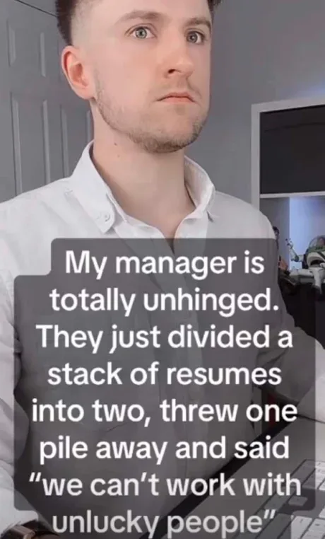 A man in a white button-down shirt stares with a bewildered, slightly horrified expression. Overlaid text reads: 'My manager…