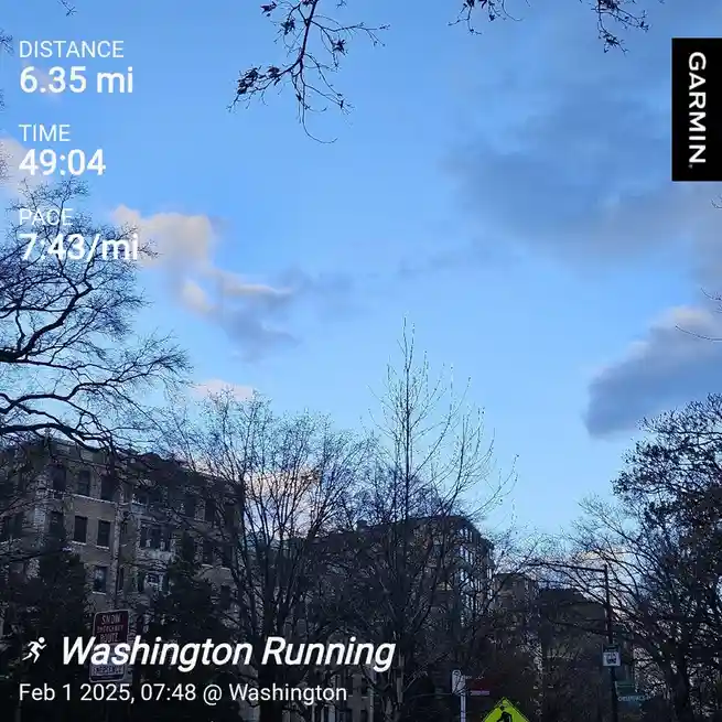 A screenshot from a Garmin fitness tracker shows a running session in Washington, with stats like 6.35 miles distance, 49:04…