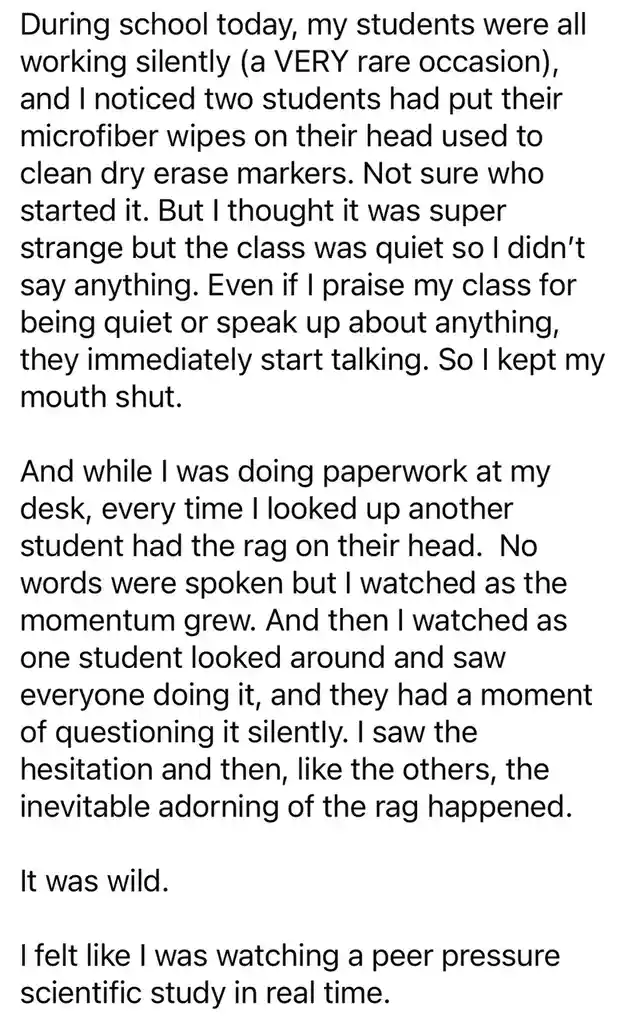 The image is a text-only meme featuring a teacher's account of a classroom incident where students silently began placing…