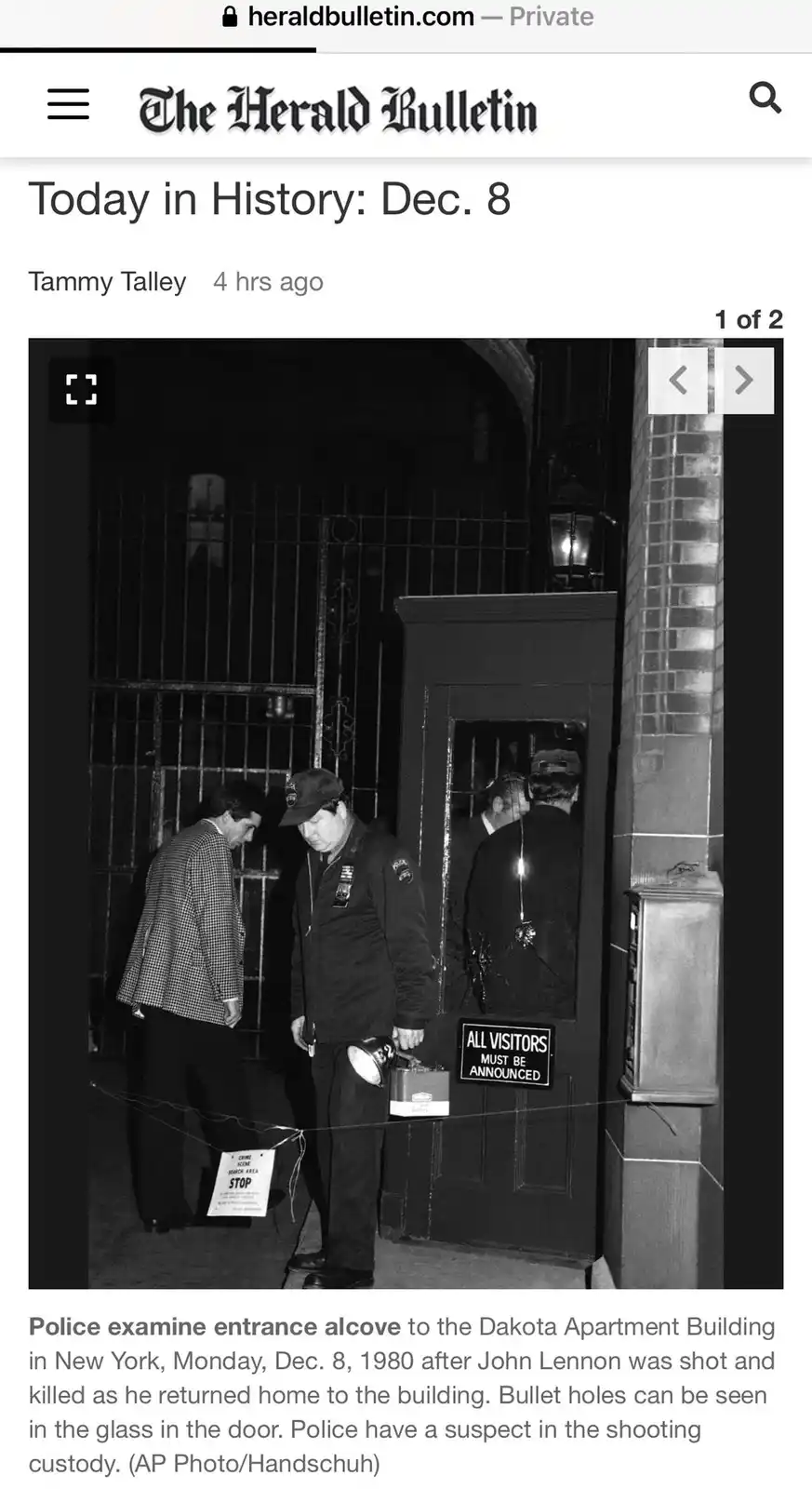 A black and white photo shows police officers examining the entrance to the Dakota Apartment Building in New York on Dec. 8…