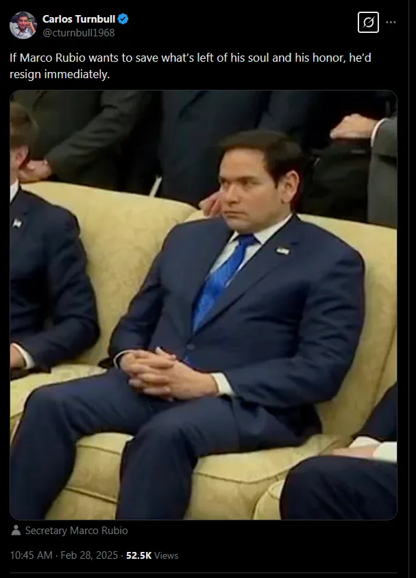 A screenshot of a tweet by Carlos Turnbull showing Marco Rubio sitting on a beige couch in a dark suit and blue tie, looking…