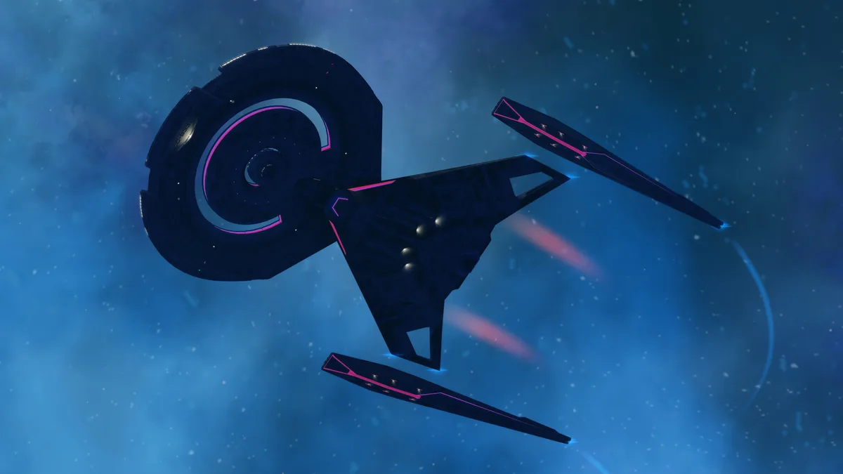 A dark blue starship with pink glowing accents and a large circular saucer section is shown in space against a blue nebula…
