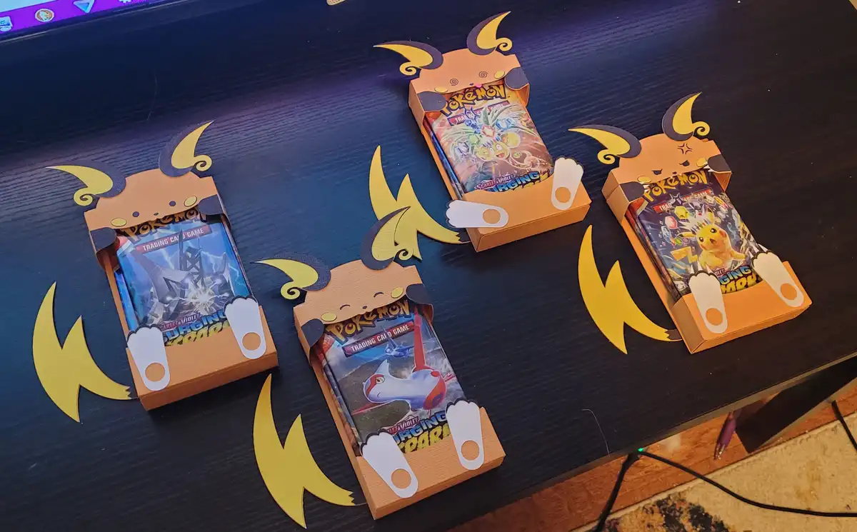 Check out my latest Christmas craft: Custom Raichu Booster Pack Boxes!