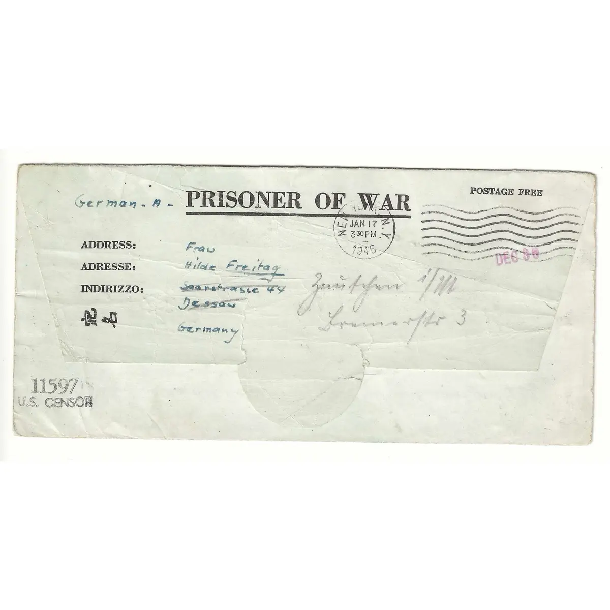 A vintage, crumpled World War II-era U.S. prisoner of war mail envelope addressed to Frau Hilde Freitag in Dessau, Germany…