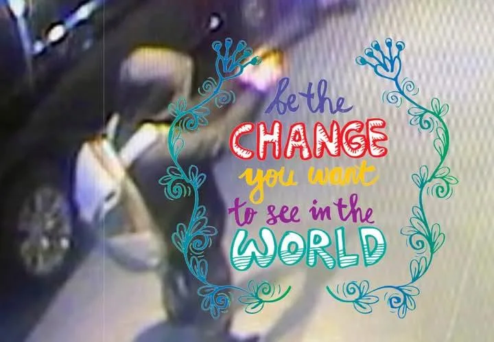 A blurry, low-resolution image, likely from a security camera, shows a person in a dark hoodie and light-colored pants…