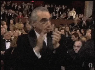 A six-panel image collage from an awards ceremony showing various attendees clapping. The central panel features a smiling…