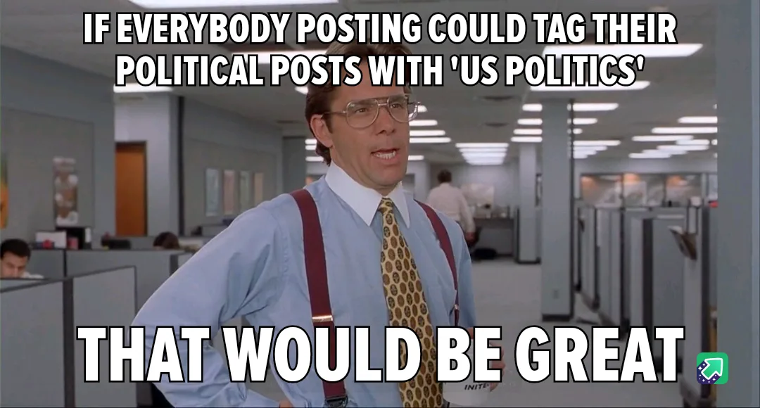 A man in a light blue shirt, patterned tie, and red suspenders stands in an office with cubicles, looking earnestly at the…