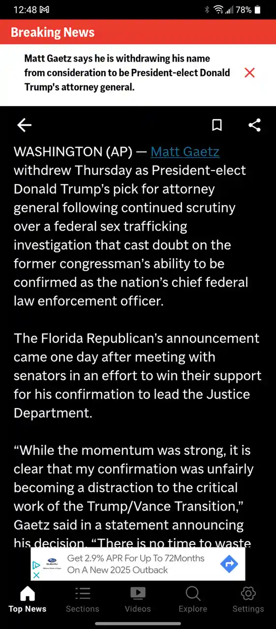 A screenshot of a news article on a mobile phone showing a 'Breaking News' banner about Matt Gaetz withdrawing his…
