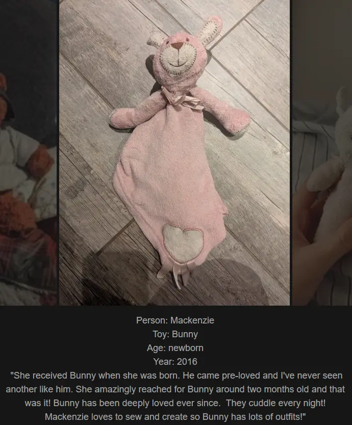 A pink, plush bunny-shaped security blanket with a smiling face and a heart appliqué lies on a wooden floor. Overlaid text…