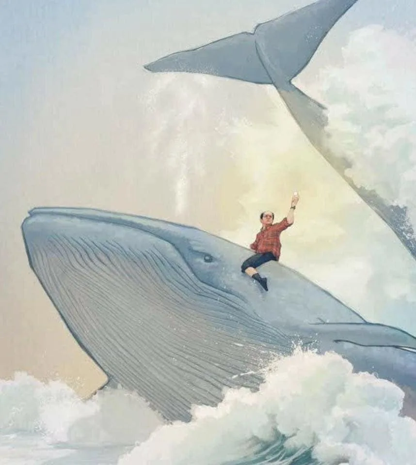 A person in a red plaid shirt and dark pants sits atop the back of a large blue whale, raising one arm in a triumphant or…
