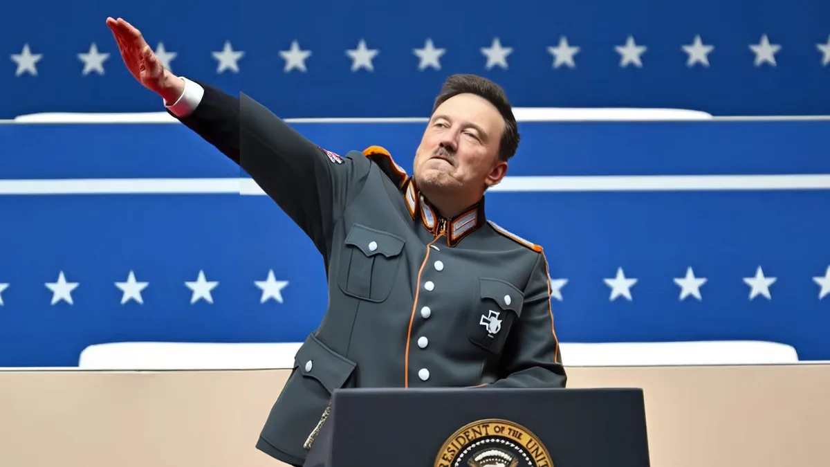 a man in a dark gray military-style uniform with orange trim and a white cross insignia stands at a podium bearing the seal…
