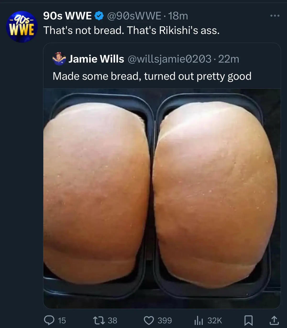 Two round, golden-brown loaves of bread sit side-by-side in black baking pans, their shape and size resembling human…