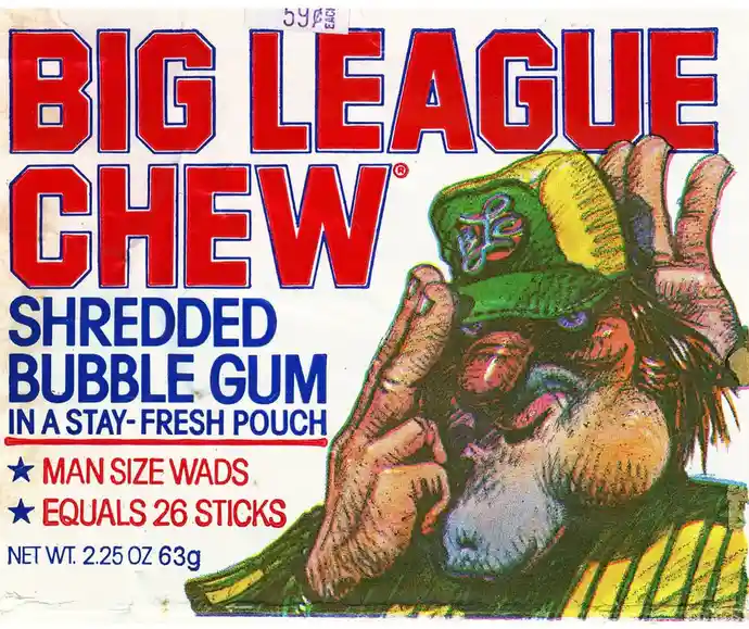 The image shows a vintage Big League Chew gum package featuring a cartoonish, muscular man in a green and yellow cap, making…