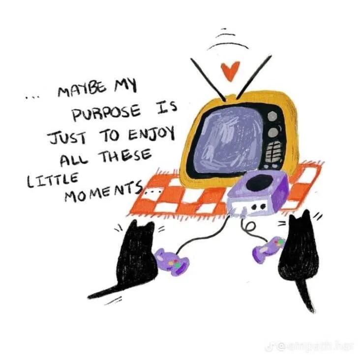A hand-drawn cartoon shows two black cats sitting on a red-and-white checkered blanket, each holding a purple video game…