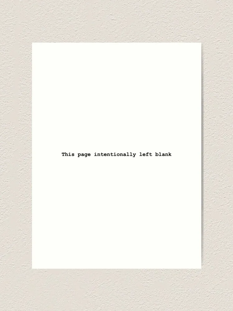 A plain white rectangular page is mounted on a textured off-white wall. Centered on the page is the text 'This page…