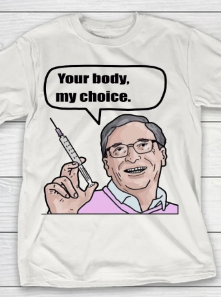 A white t-shirt displays a cartoon illustration of a man with glasses and a pink sweater holding a syringe. A speech bubble…