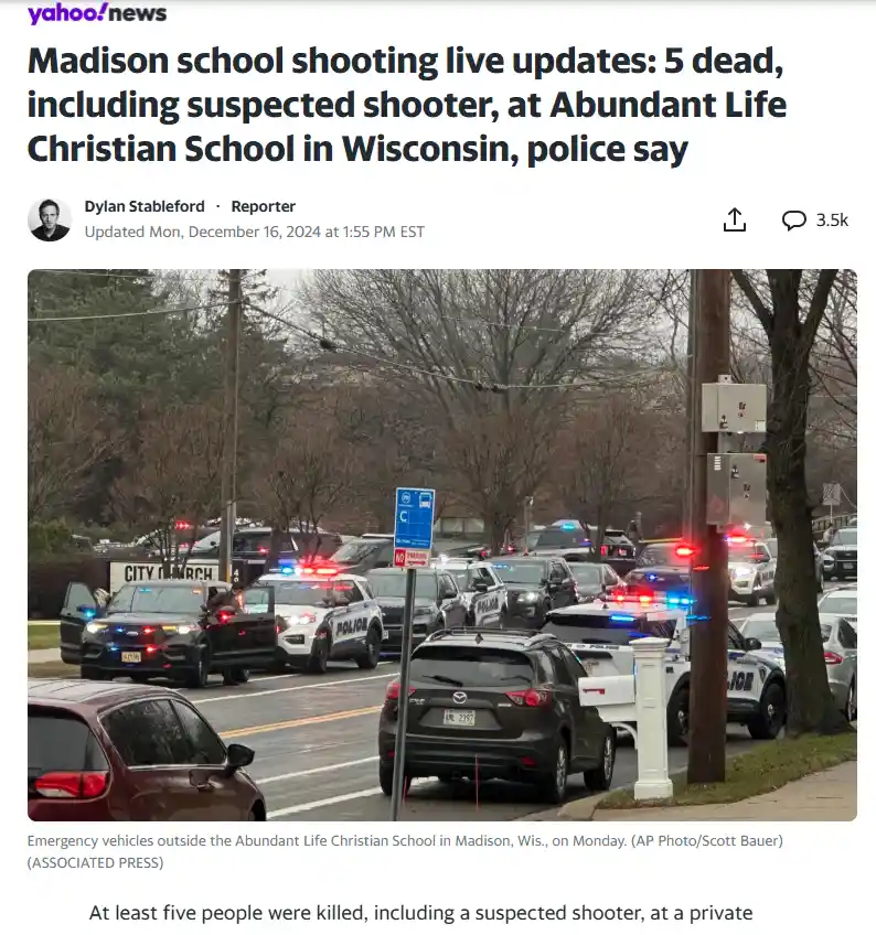 A screenshot of a Yahoo News article shows a street scene with numerous police cars and flashing lights surrounding a…