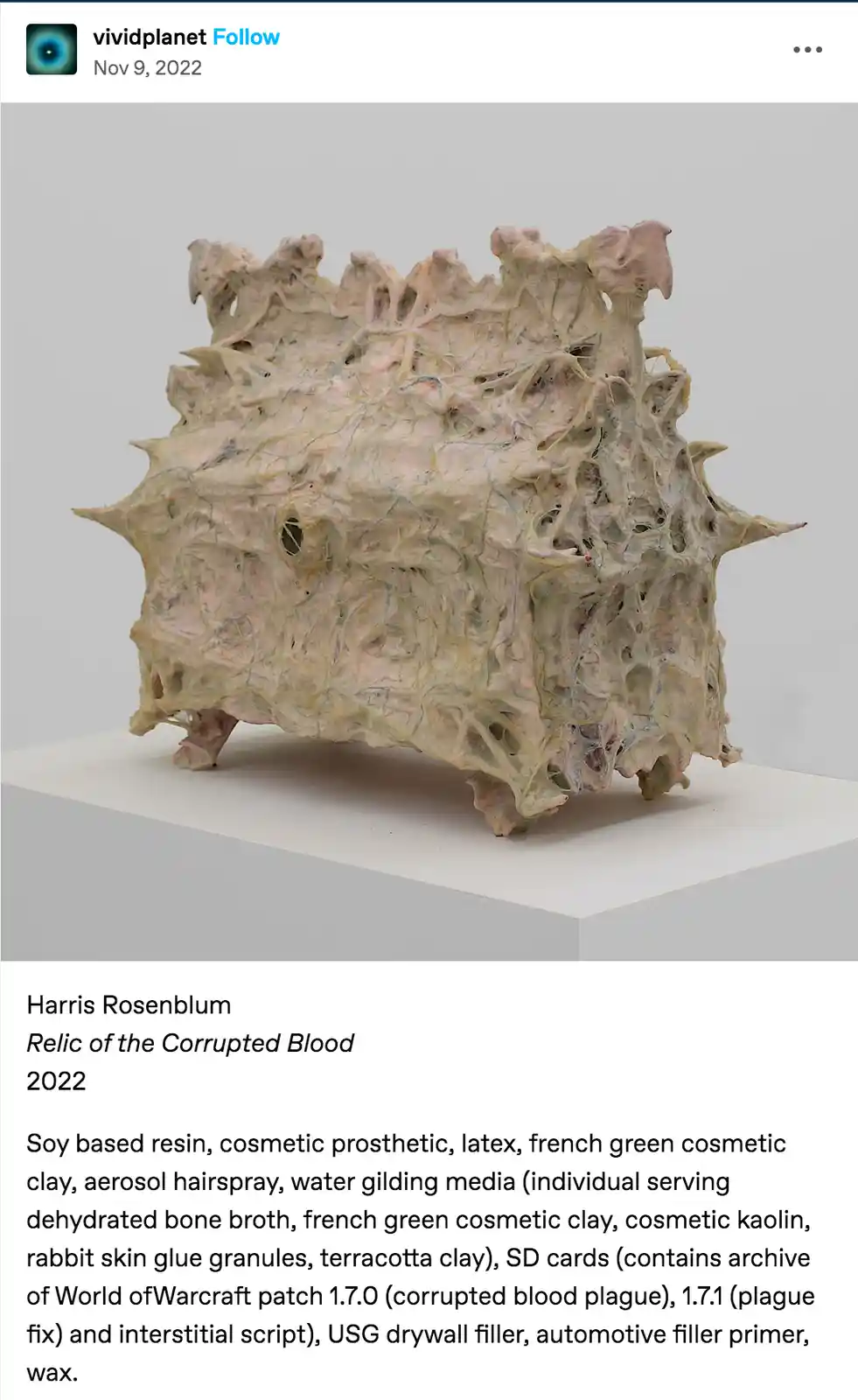 A textured, organic-looking sculpture resembling a grotesque, spiky mass sits on a white pedestal. The overlaid text…