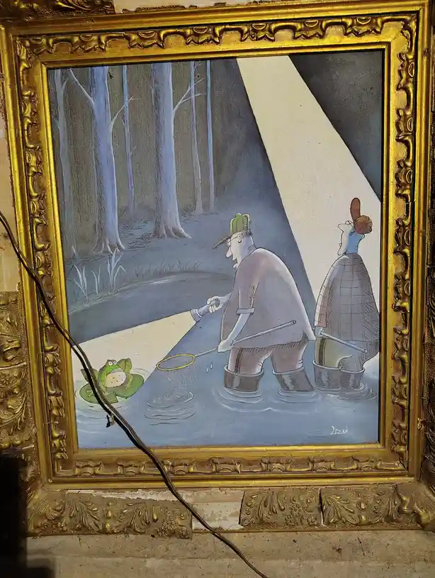 A framed painting depicts two hunters in a swamp, one holding a flashlight and net, aiming at a frog on a lily pad. The frog…