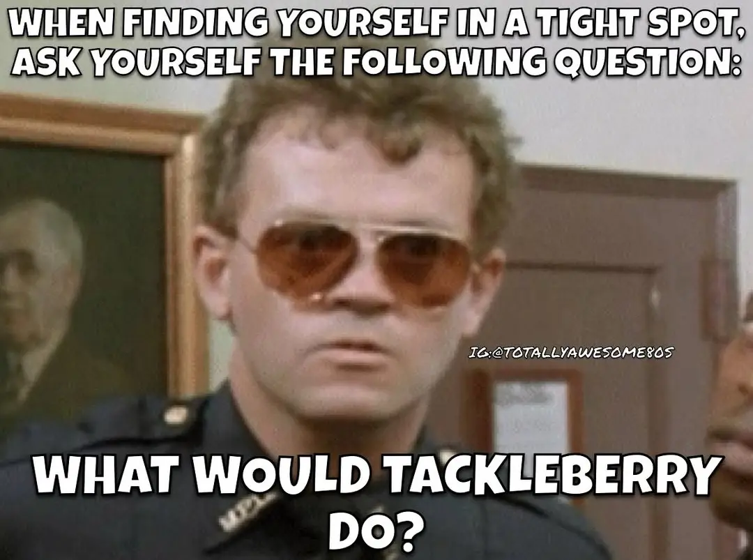 A man in a police uniform wearing aviator sunglasses stares intently at the viewer. Overlaid text reads: 'WHEN FINDING…