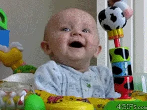 A baby in a playpen is shown in six frames, transitioning from a wide, joyful smile to a progressively more shocked and…