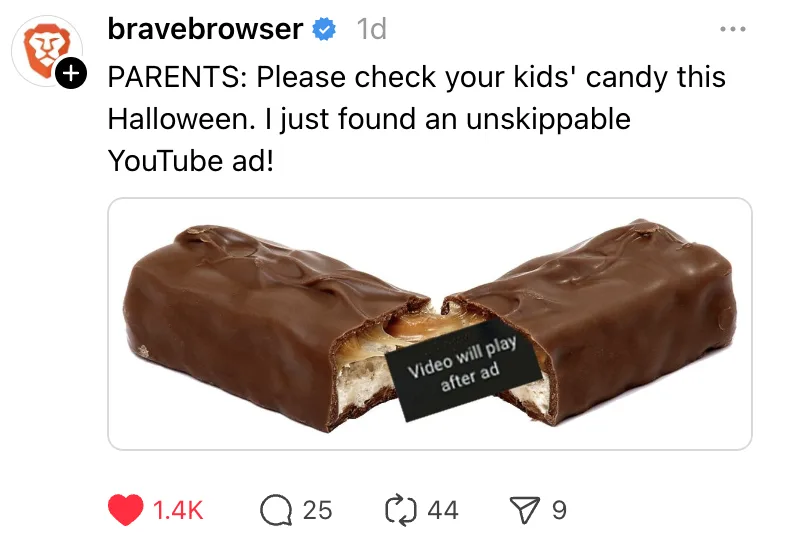 An image of a broken chocolate candy bar with a small black label inside the break that reads 'Video will play after ad'…