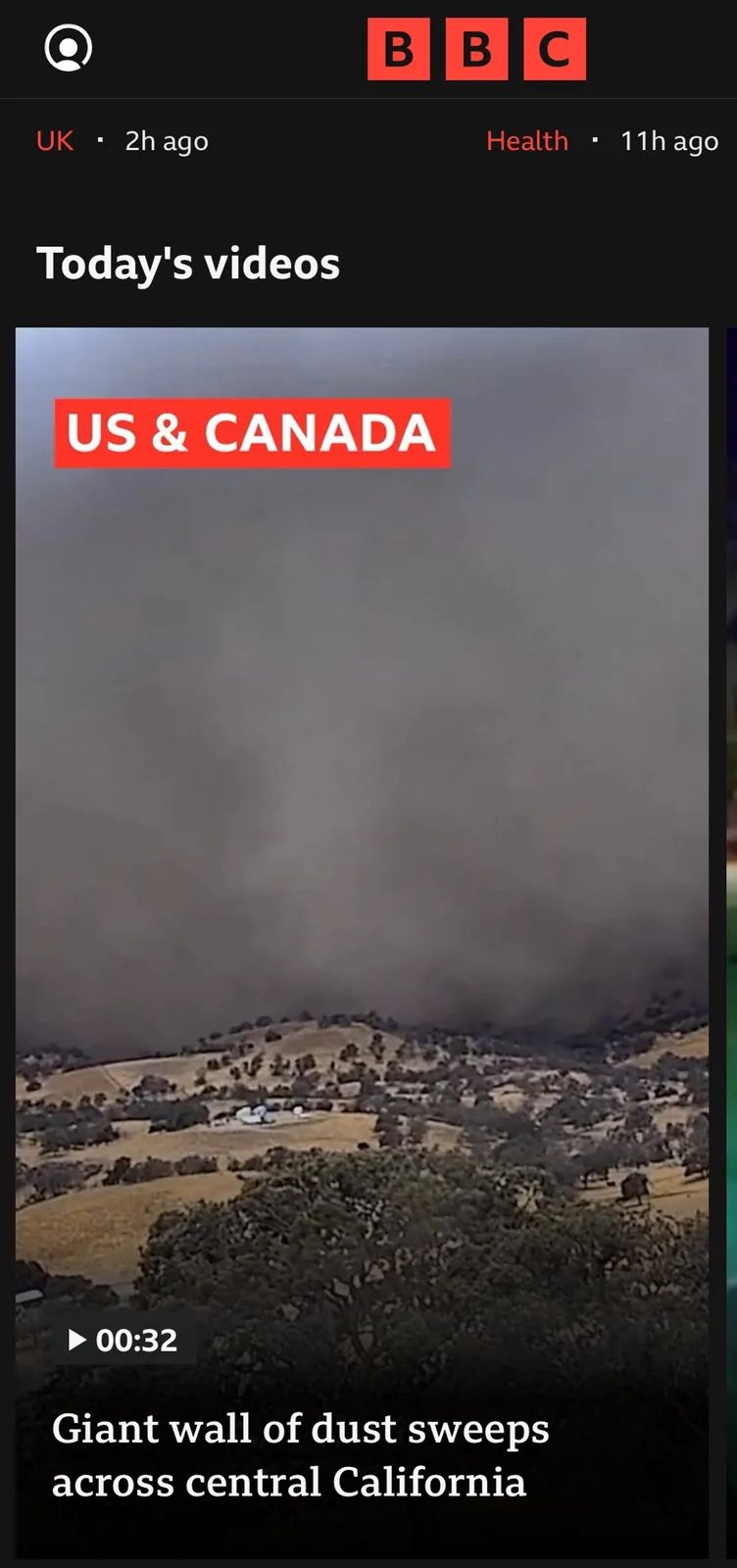 A screenshot of a BBC news video thumbnail shows a massive, dark wall of dust or smoke rolling over a rural landscape in…