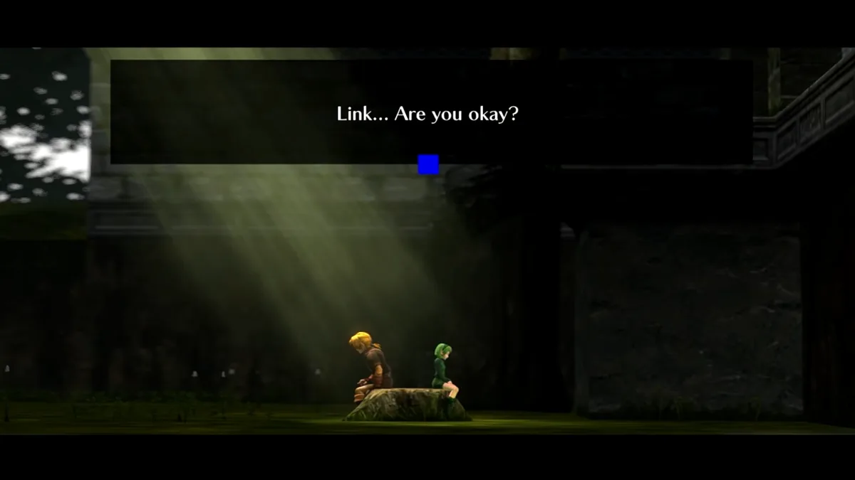 In a dimly lit, atmospheric scene from The Legend of Zelda: Twilight Princess, Link and Midna sit side by side on a mossy…