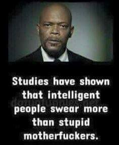 A black-and-white photo of Samuel L. Jackson in a suit and tie, looking serious, with white text overlaid that reads…