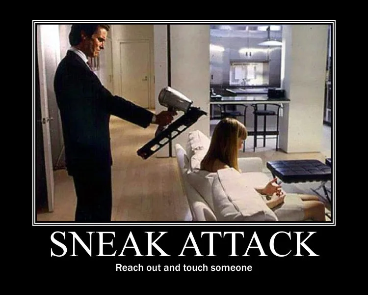 A man in a dark suit stands holding a hairdryer like a weapon, aiming it at a woman sitting on a white couch. The image has…