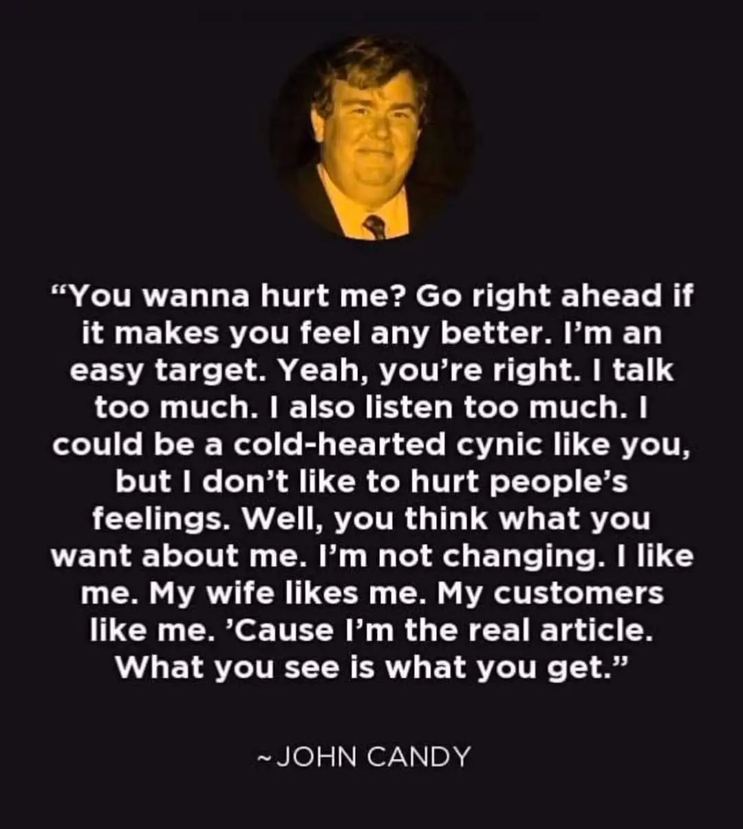 A circular portrait of John Candy is centered above a block of white text on a black background. The text is a quote…