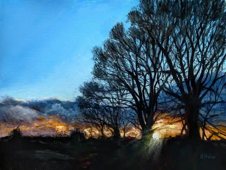 An oil painting depicts a dark, leafless tree silhouetted against a blue sky, with warm orange and purple light illuminating…