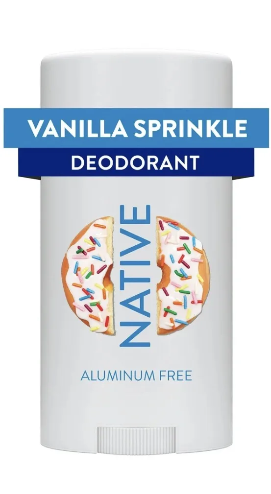 A white deodorant stick labeled 'VANILLA SPRINKLE DEODORANT' with a graphic of a split vanilla sprinkle donut forming the…