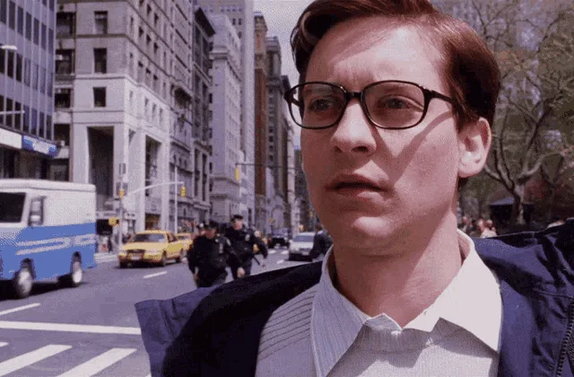 A six-panel image sequence shows a man with glasses in a city street, transitioning from a neutral expression to eating a…