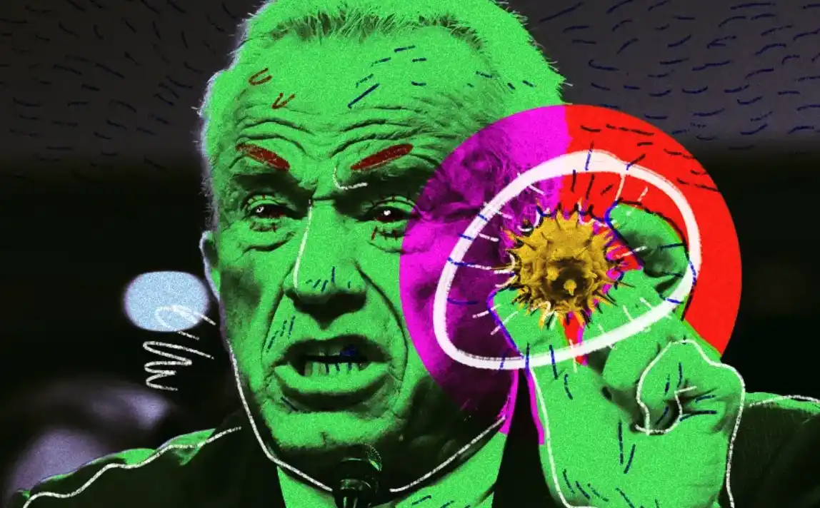 a digitally altered image of a man with a green tint, his face contoured with white lines and blue scribbles, holding a…