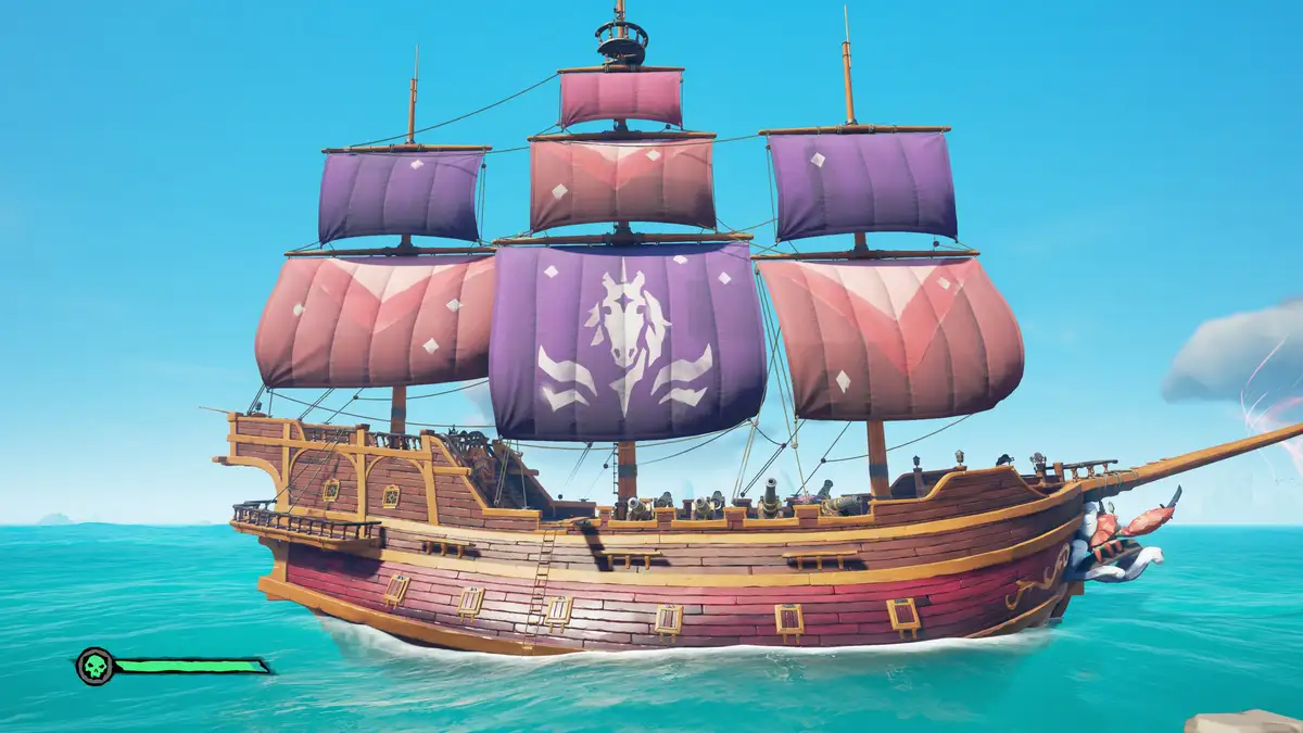 A pirate ship with purple and pink sails, one featuring a white unicorn skull emblem, sails on turquoise water under a clear…