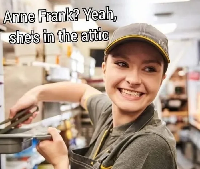A young woman wearing a McDonald's cap and apron smiles while holding a tray in what appears to be a fast-food kitchen. The…