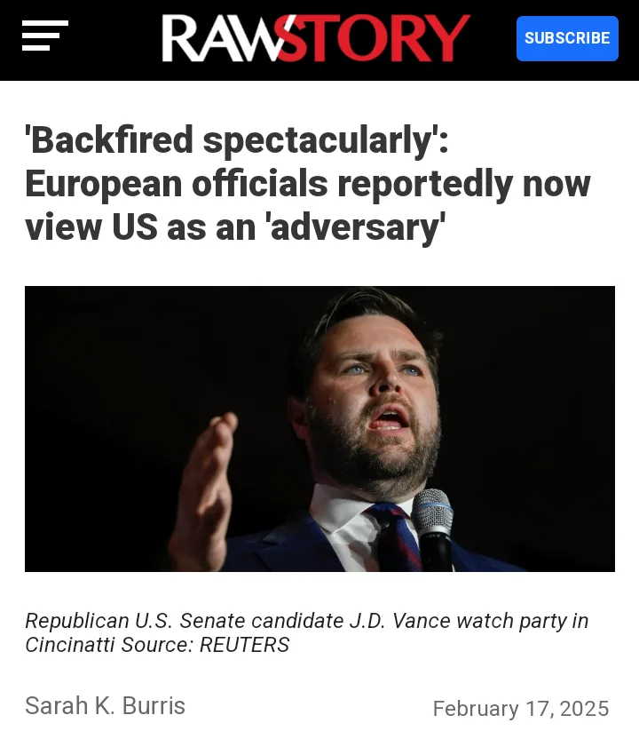 A screenshot of a RawStory news article featuring a photo of J.D. Vance speaking into a microphone, with his hand raised…
