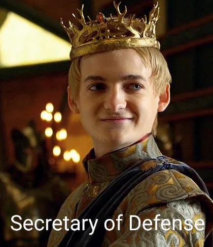 A young man with blond hair wearing a golden crown and ornate royal robes smiles smugly at the camera. The text 'Secretary…