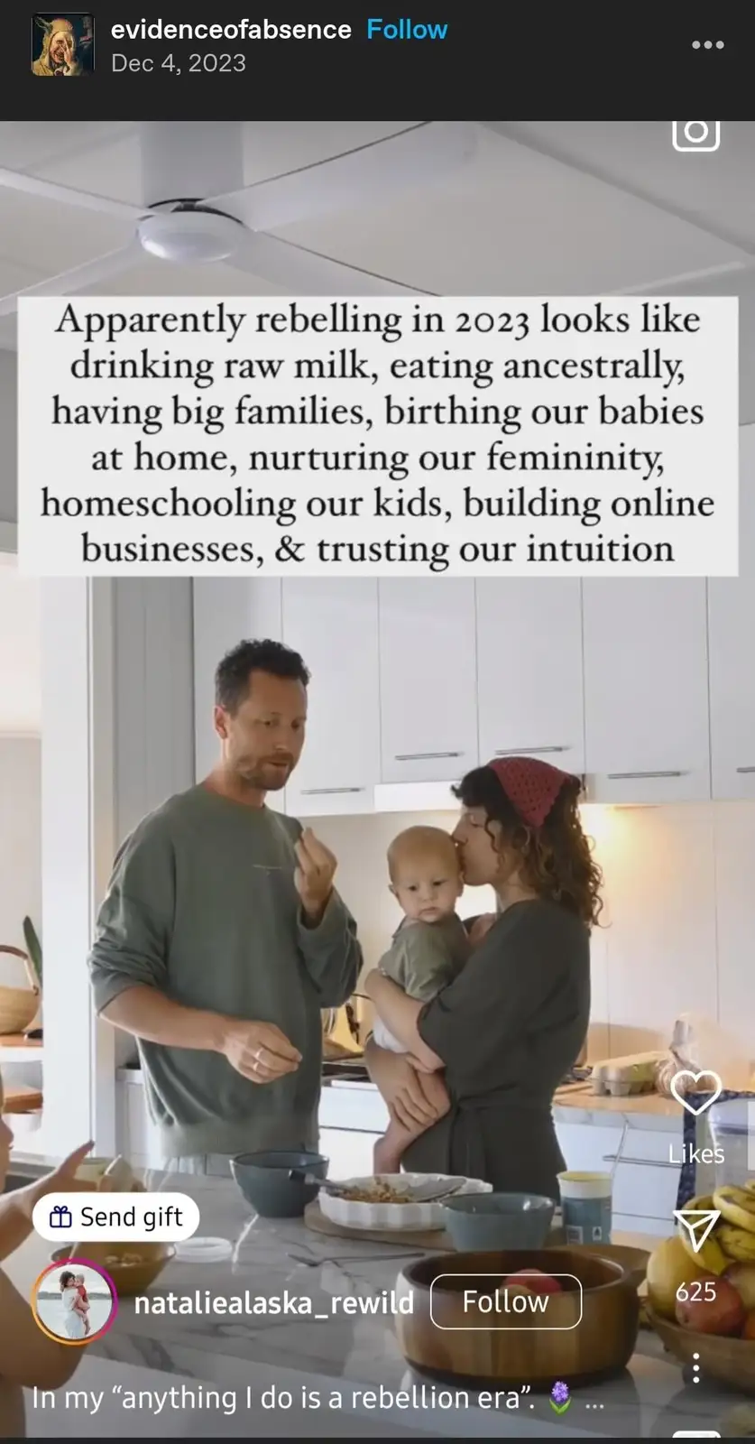 A man and woman stand in a modern kitchen, the woman holding a baby while kissing its cheek, with the man gesturing as if…