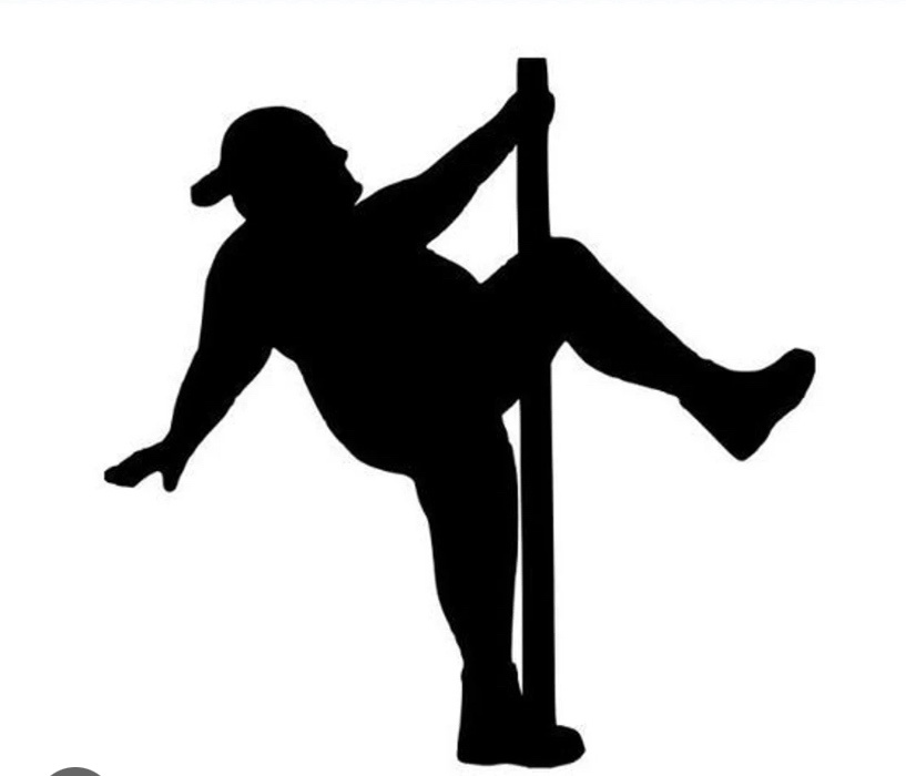 A black silhouette of a person wearing a cap, clinging to a vertical pole with one hand and one leg, while the other leg is…