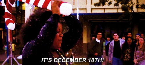 A six-panel meme strip shows a woman in a festive setting, initially holding a giant candy cane and shouting 'IT'S DECEMBER…