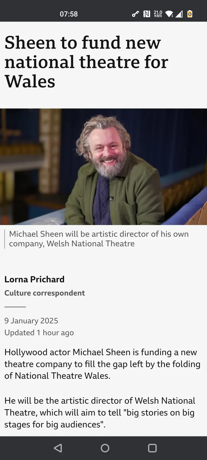 A screenshot of a news article about actor Michael Sheen funding a new theatre company, with his smiling photo. The headline…